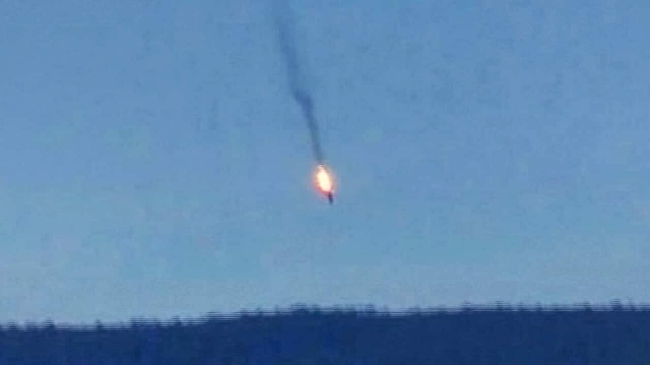 A Russian warplane on fire.