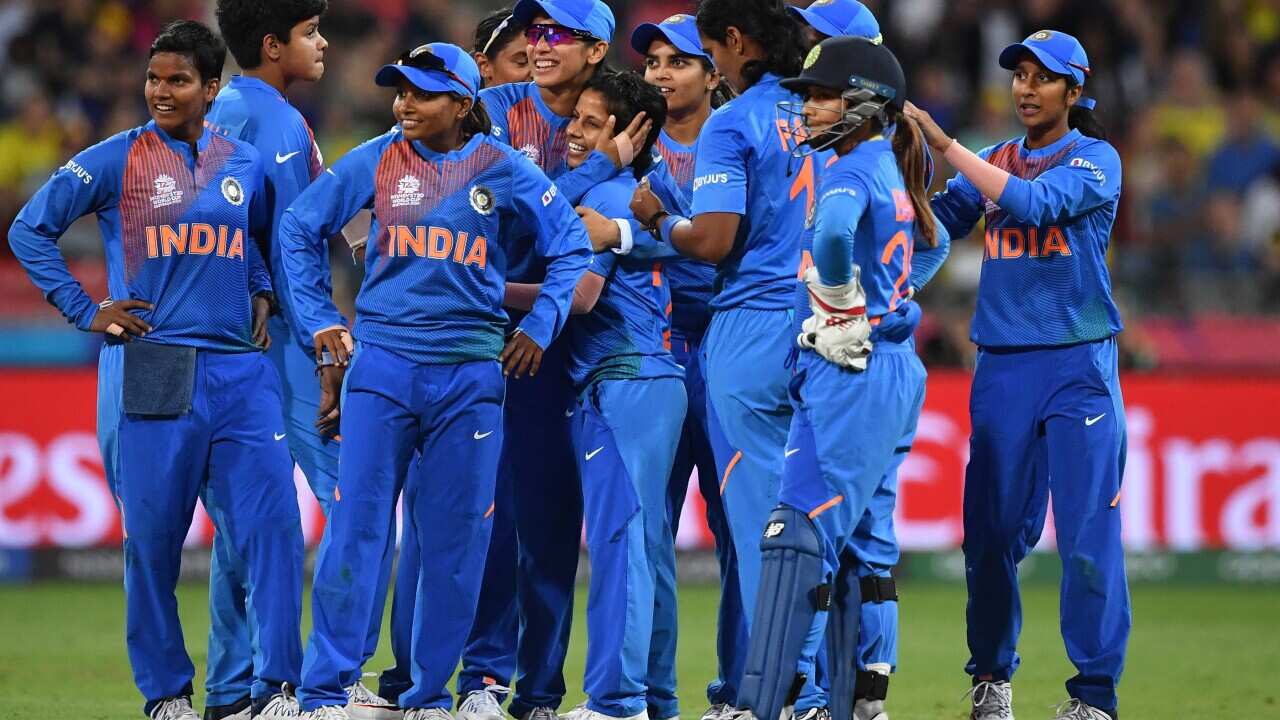 India celebrate the wicket of Ellyse Perry of Australia bowled by Poonam Yadav (centre) of India during the WT20 World Cup cricket match.
