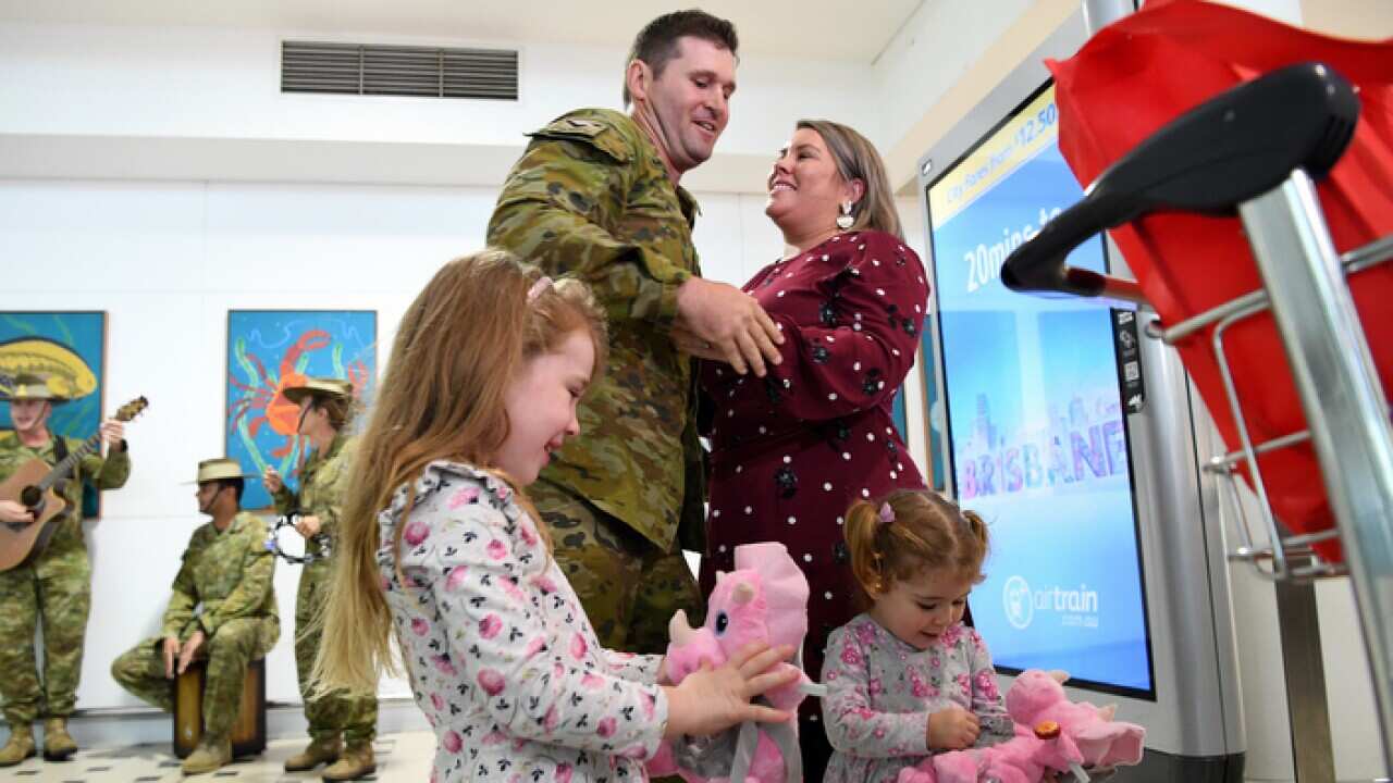 Australian Defence Force Scott McDowell member returns to Brisbane from training and advising mission in Iraq