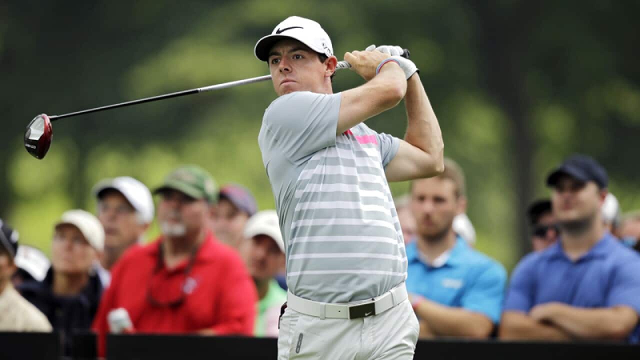 Rory McIlroy watches his drive