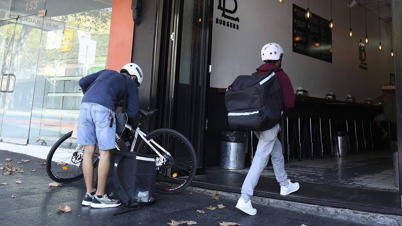 Food delivery riders at a restaurant in Sydney.