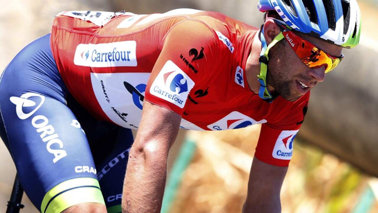 Australian Michael Matthews wearing the overall leader's red jersey