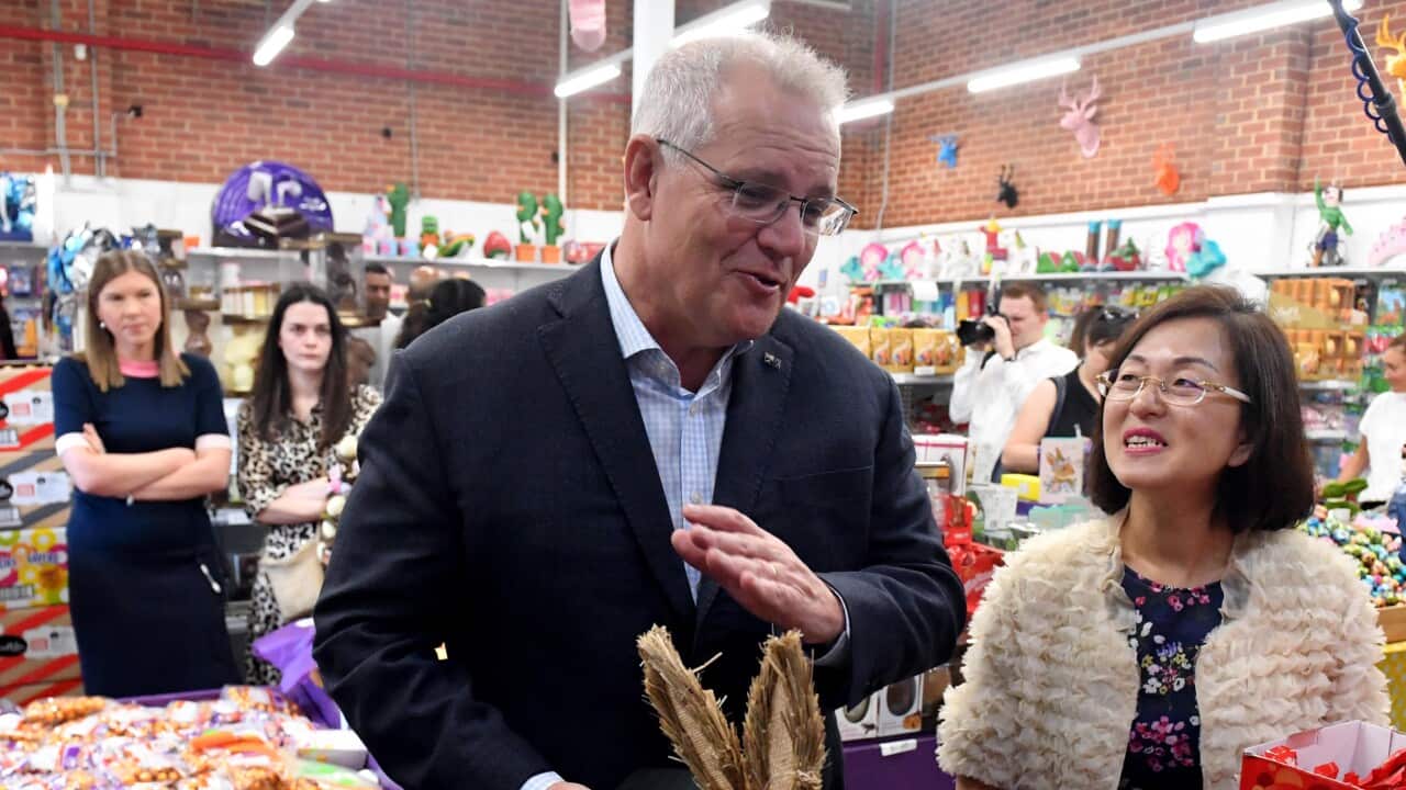 Former prime minister Scott Morrison (left) with former Liberal member for Chisholm Gladys Liu on the 2022 campaign trail.