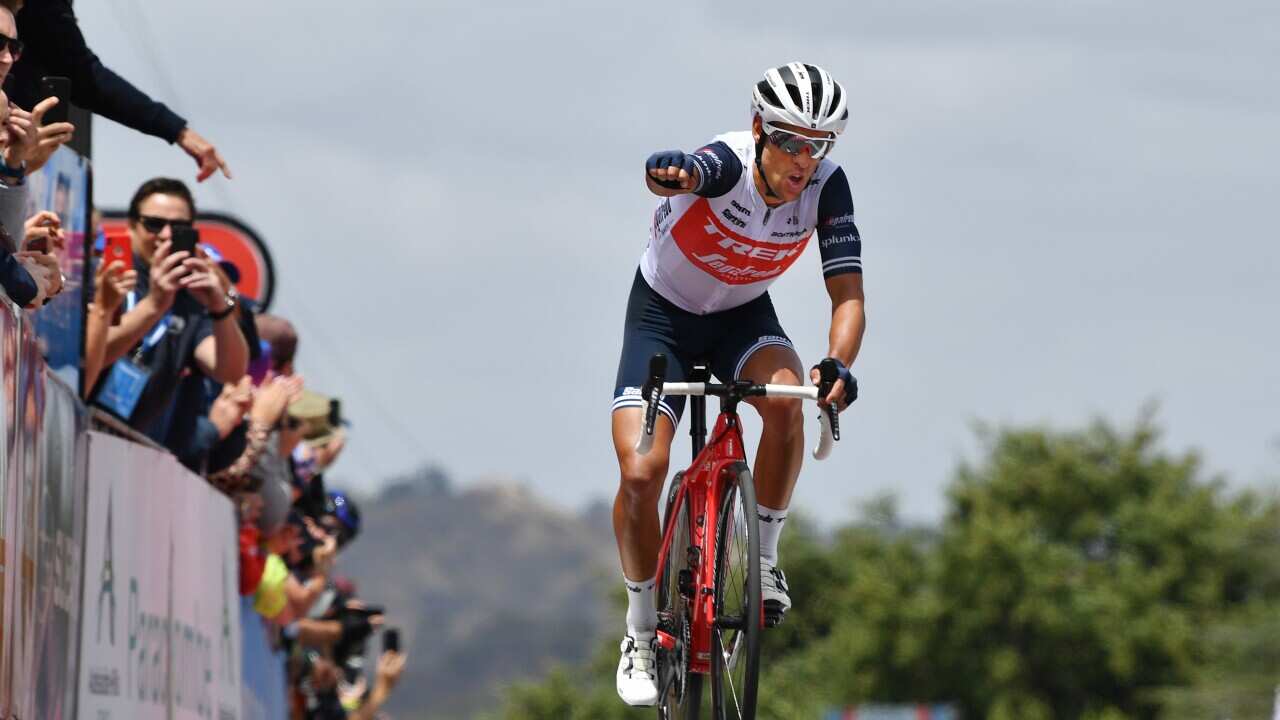 Richie Porte celebrates after winning Stage 3 of the Tour Down Under atop Paracombe and moved into the leader's jersey