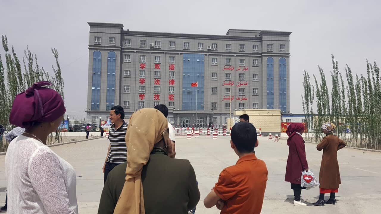 A sign describes this facility on the edge of Hotan, a city in Xinjiang, as a concentrated transformation-through-education center.