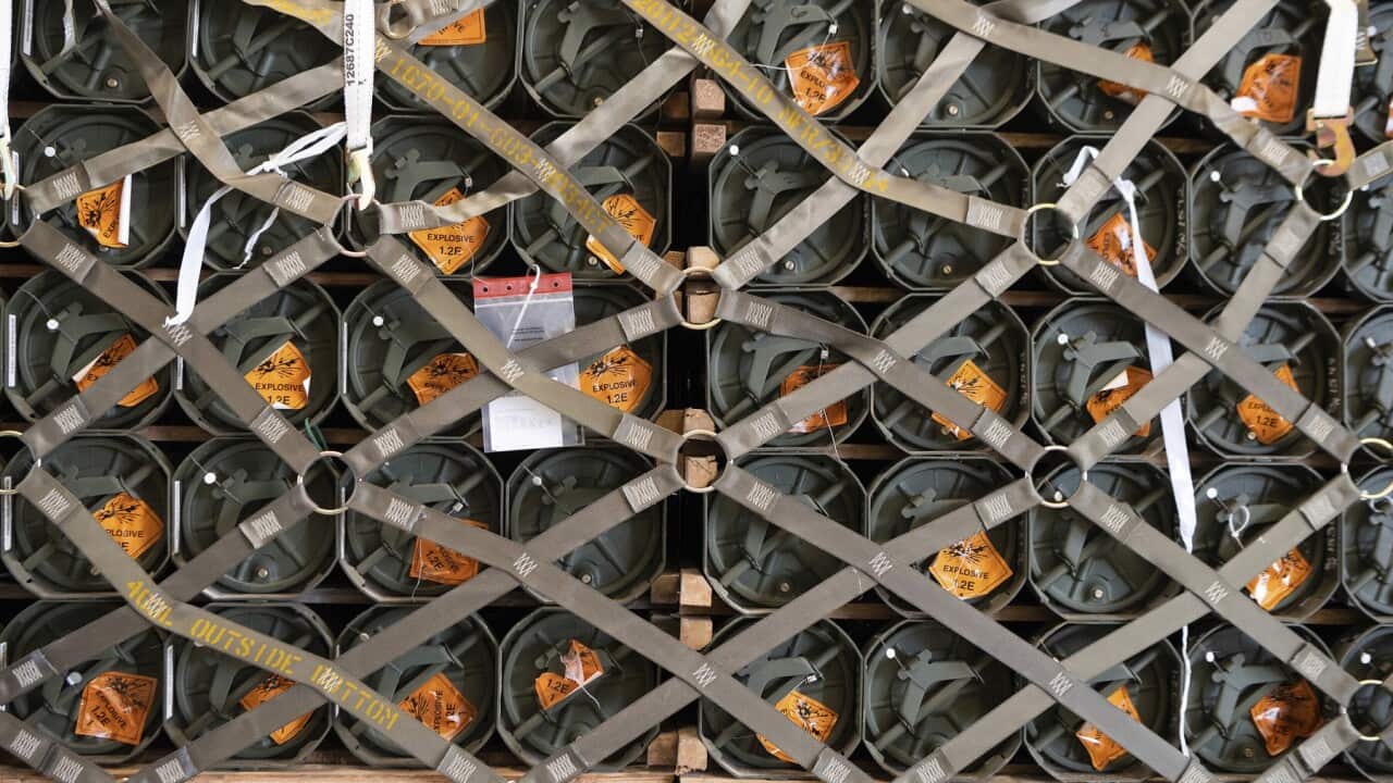 In this image provided by the U.S. Air Force, pallets of ammunition, weapons and other equipment bound for Ukraine.Photo supplied by Mauricio Campino/U.S. Air Force via AP