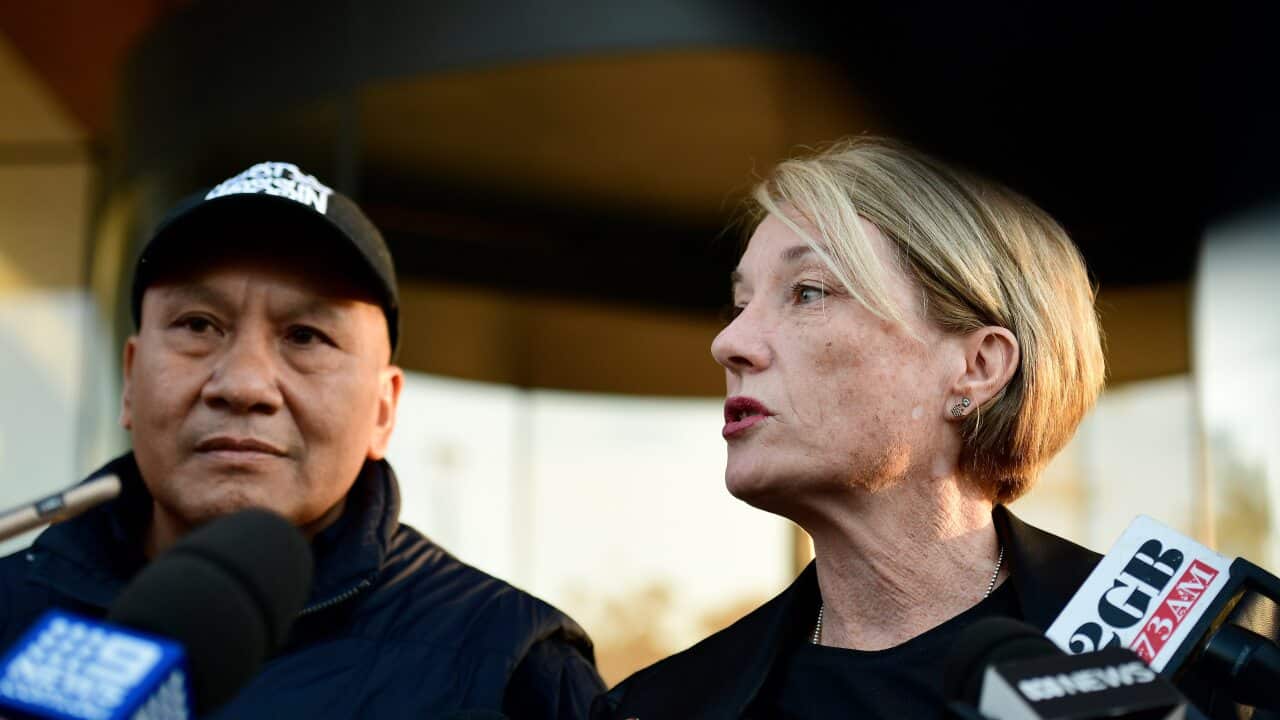John and Julie Tam, parents of Joshua Tam who died at Lost Paradise music festival in 2018, speak to the media outside of The Coroner's Court of NSW.