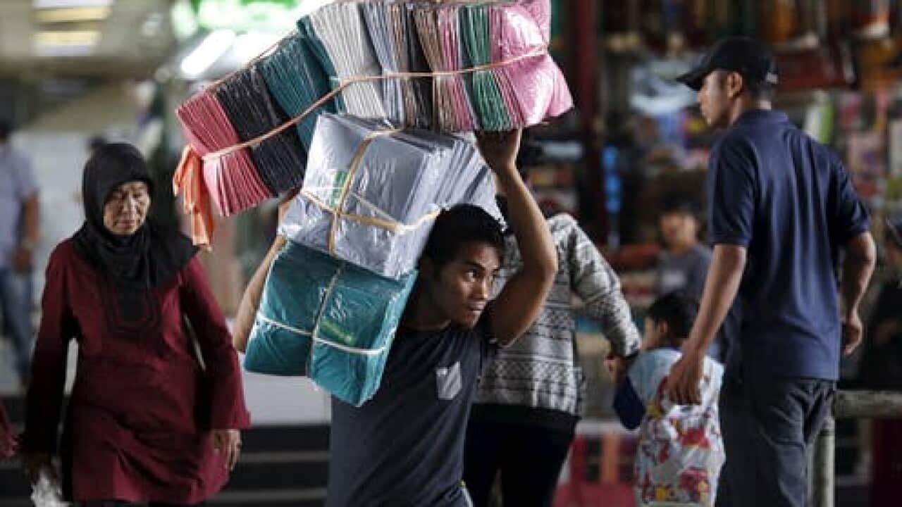 A lot of people in Indonesia juggle precarious jobs in the informal sector. They work without employment contracts and can lose their jobs without warning.