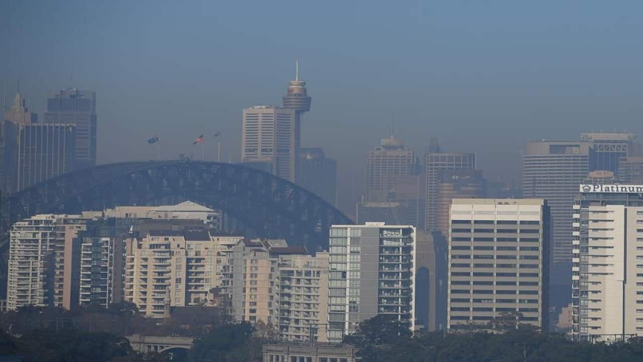 Smoke is seen blanketing the Sydney city skyline.