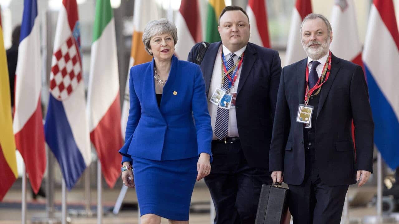 British Prime Minister Theresa May talks to media as she arrives for an EU summit in Brussels, Belgium on April 10, 2019.