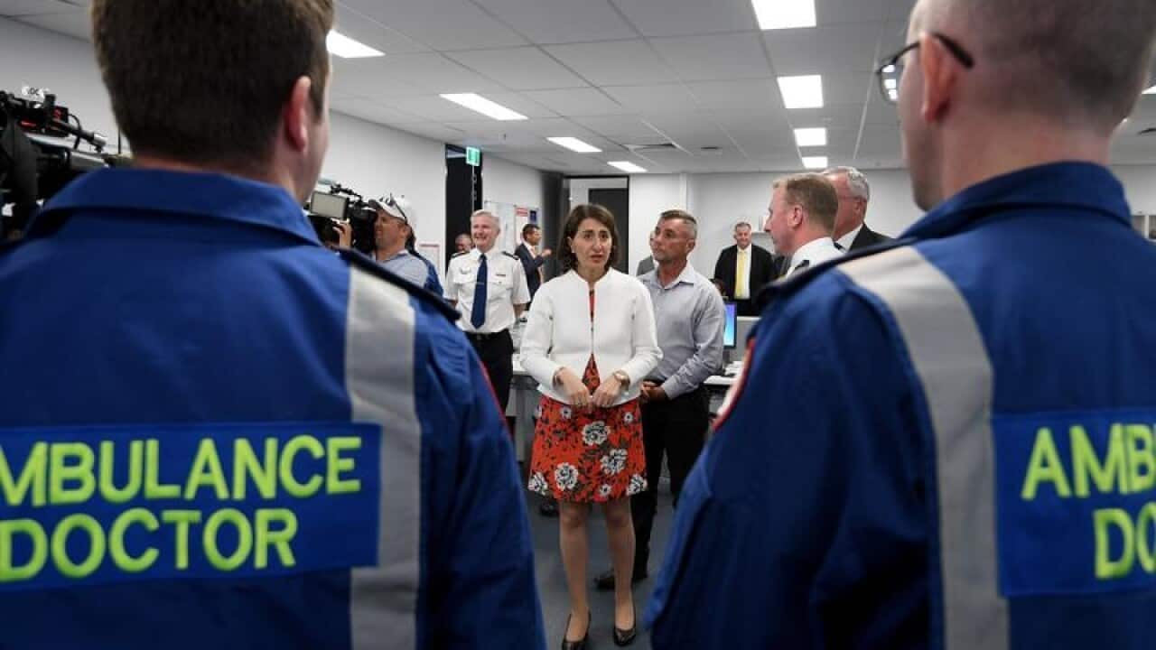 NSW Premier speaks to paramedics.