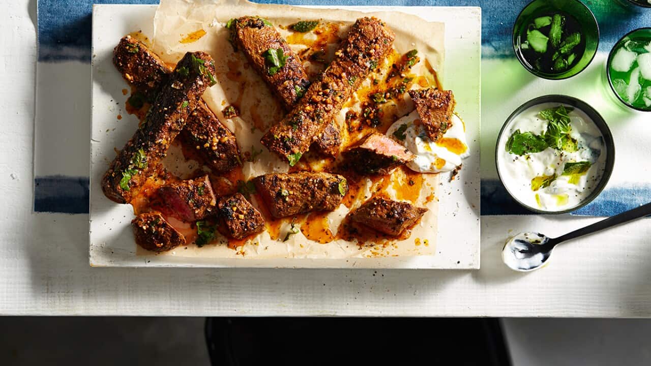 Barbecued lamb (mechoui) with minted yoghurt