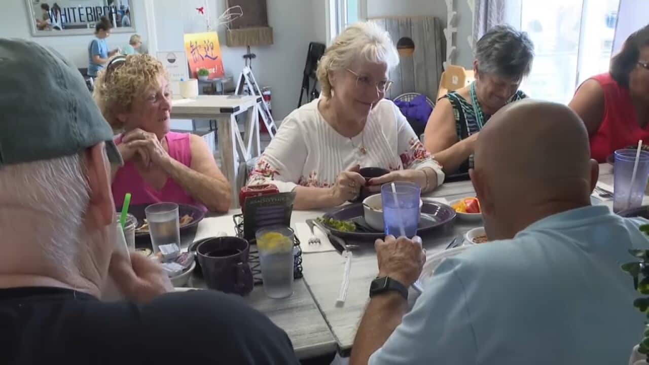 People enjoying a communal meal in the United States as part of Dine out Program. Sept 3 2023 AP.jpg