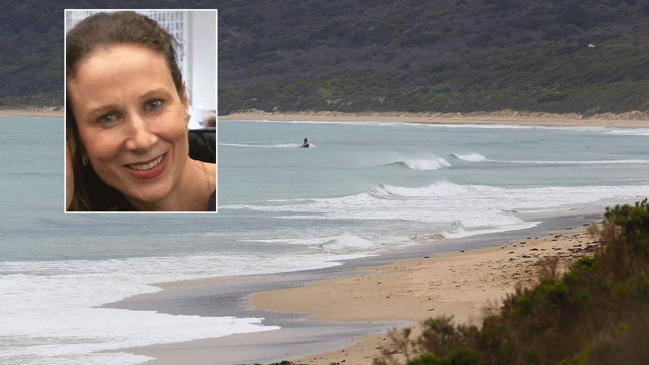 Police on jet skis search O'Donohue beach near Anglesea in Victoria on Wednesday October 11. 