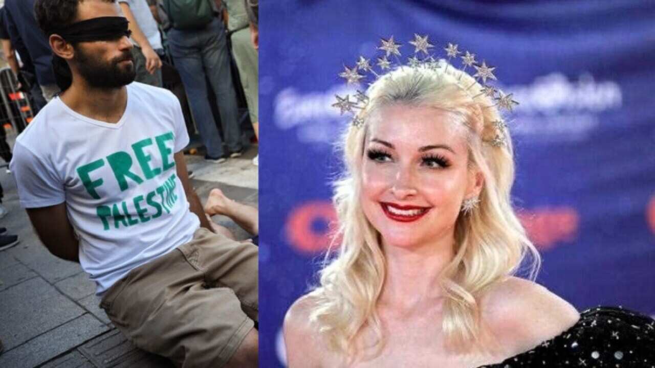 Peace activists protest before the presentation of the 2019 Eurovision Song Contest participants in Tel Aviv, Israel, Sunday, May 12, 2019. (AP Photo/Oded Balilty)