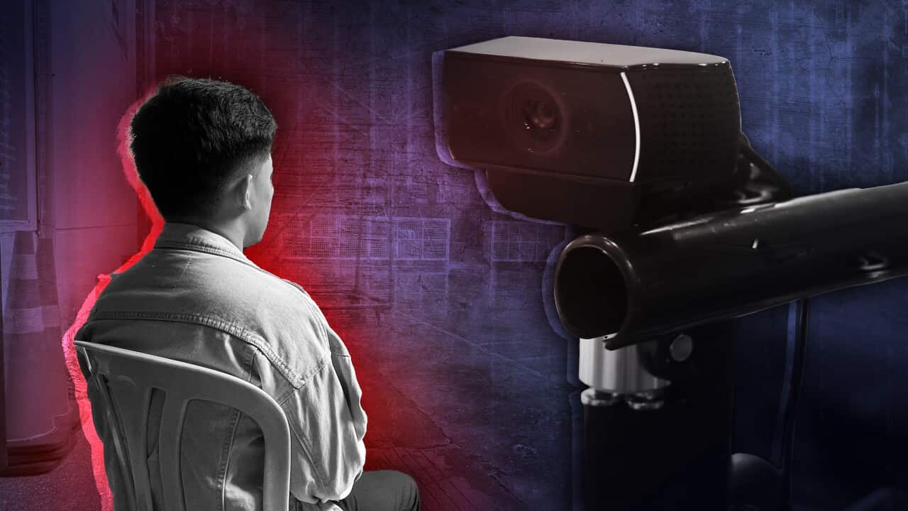 Young man looking into an empty playground