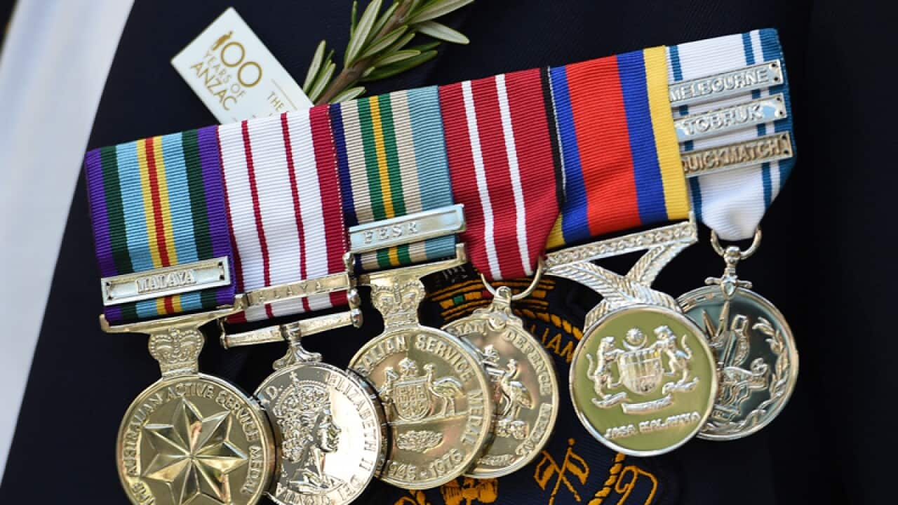 Medals are seen worn by an ex-serviceman