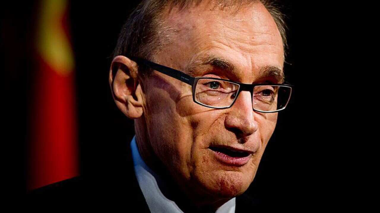 Carr talks tough on boat arrivals