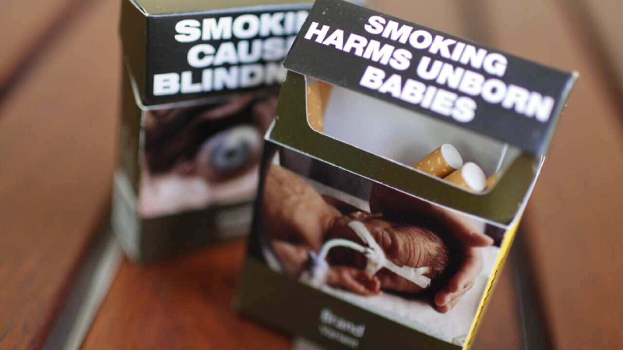 Cigarette packs with plain packaging