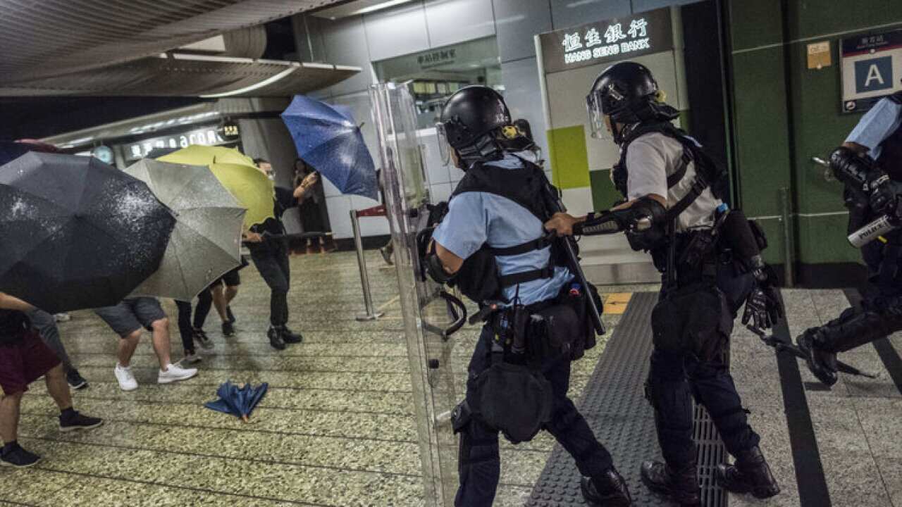 Protesters Surround Police Station After Hong Kong Charges Dozens