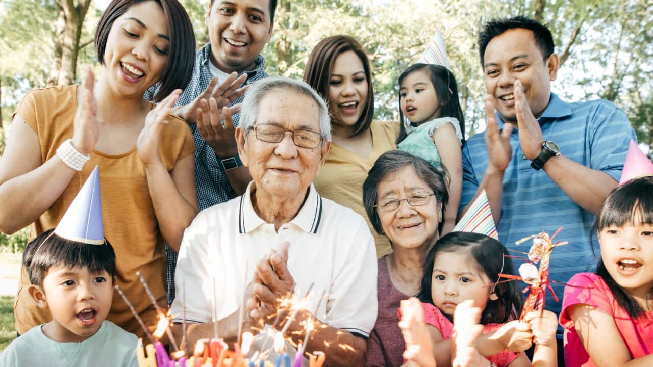 Family celebrating birthday together