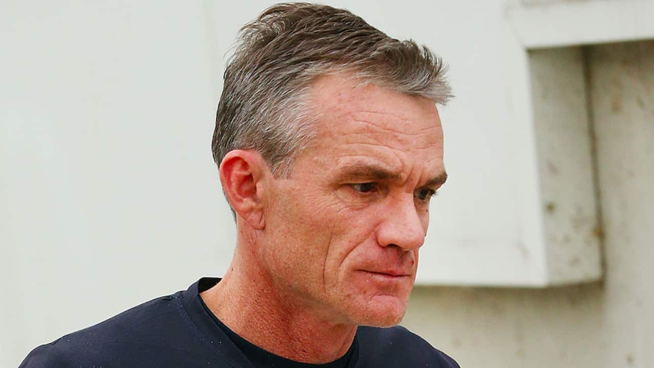 Dean Laidley as Blues assistant coach.