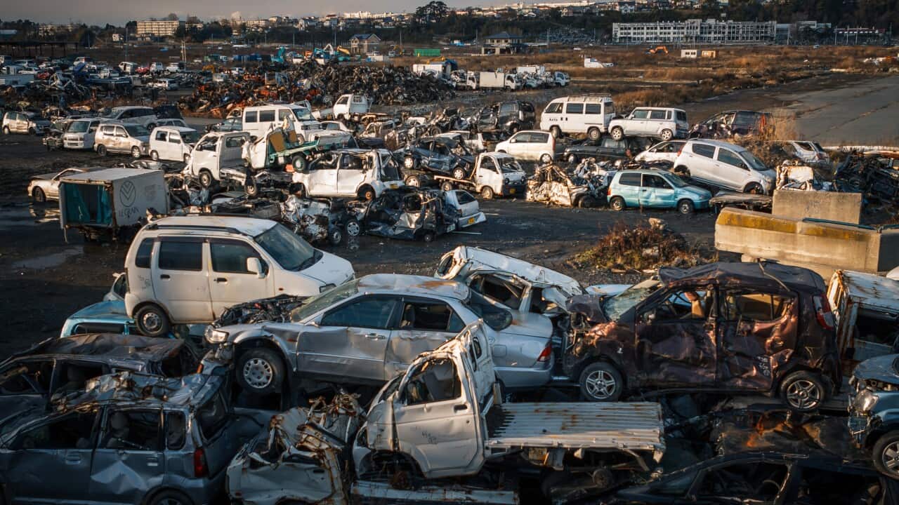 Stockpiled cars post 2011 Tohoku earthquake and tsunami. Ishinomaki, Japan