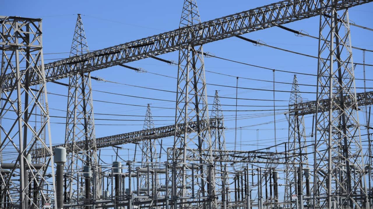 High voltage electricity transmission lines are seen at the Liddell coal fired power station in Muswellbrook