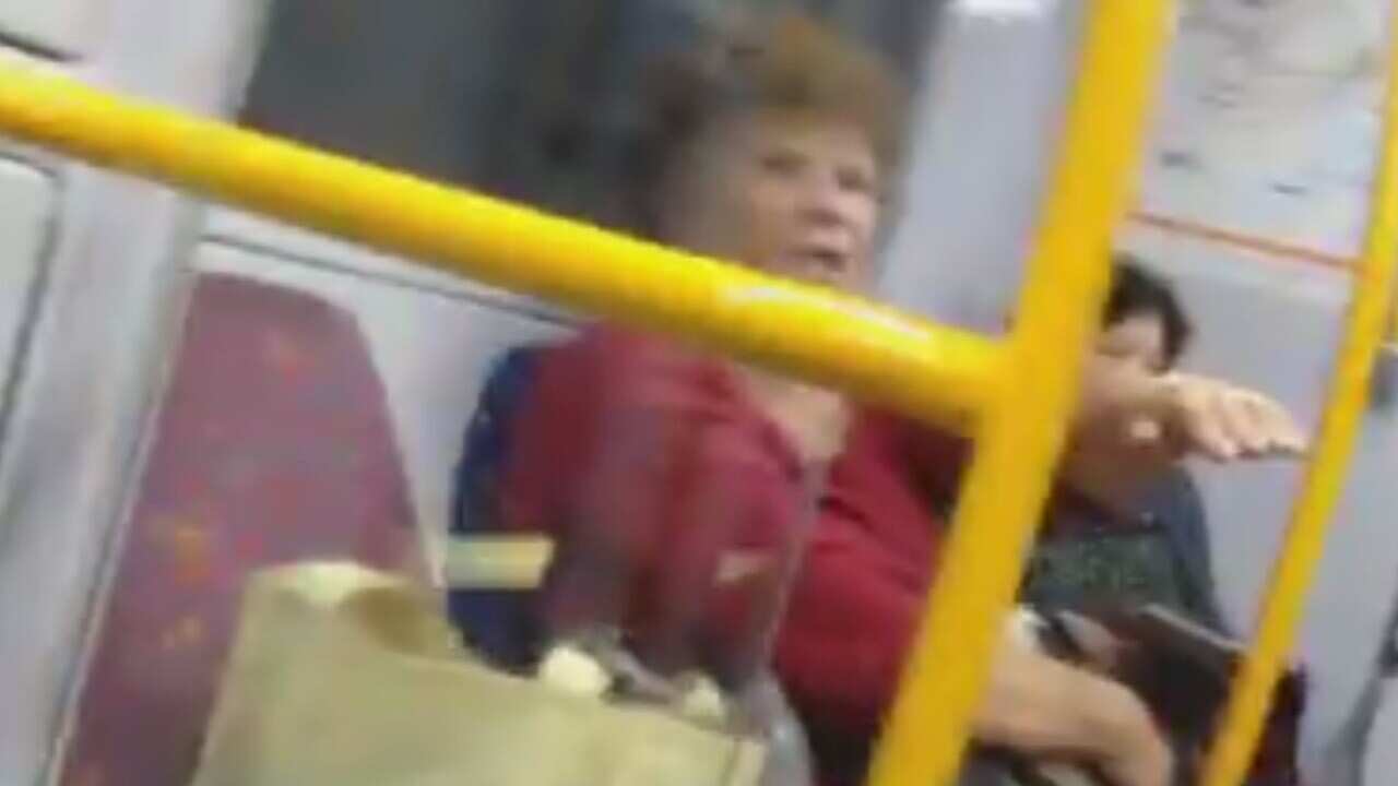 Muslim couple subjected to racist tirade on train urged to contact police. (Facebook)