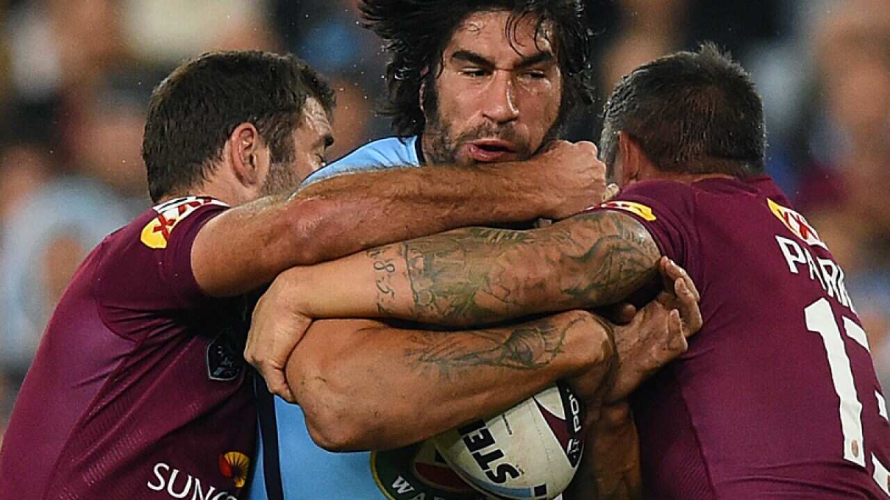 James Tamou (C) of the Blues