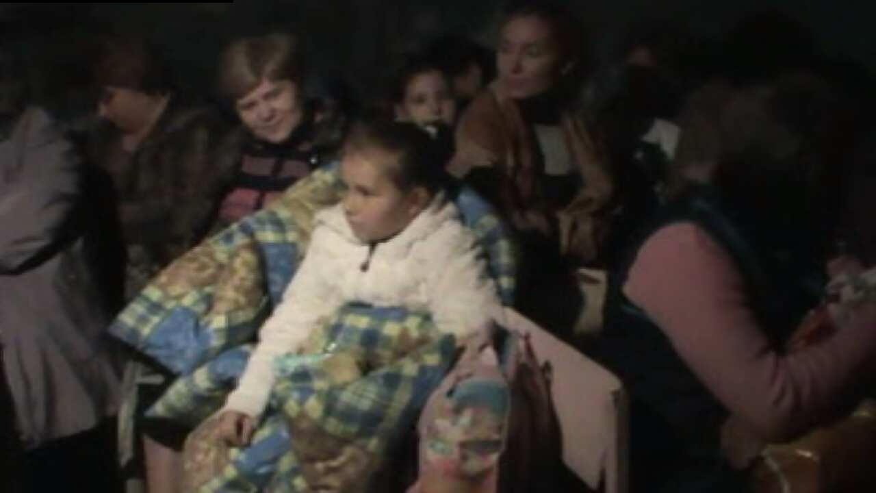Children and teachers hide in the basement of a school in Donetsk. (AP)