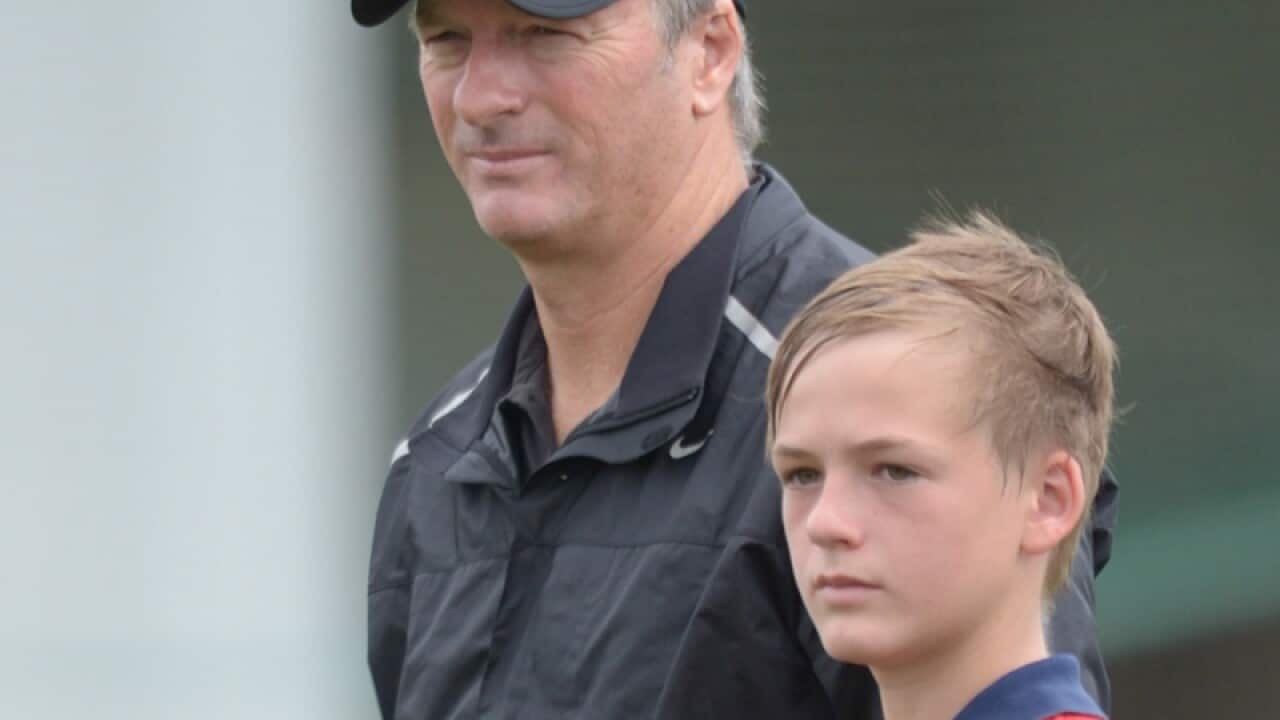 Steve Waugh with his son Austin in 2013
