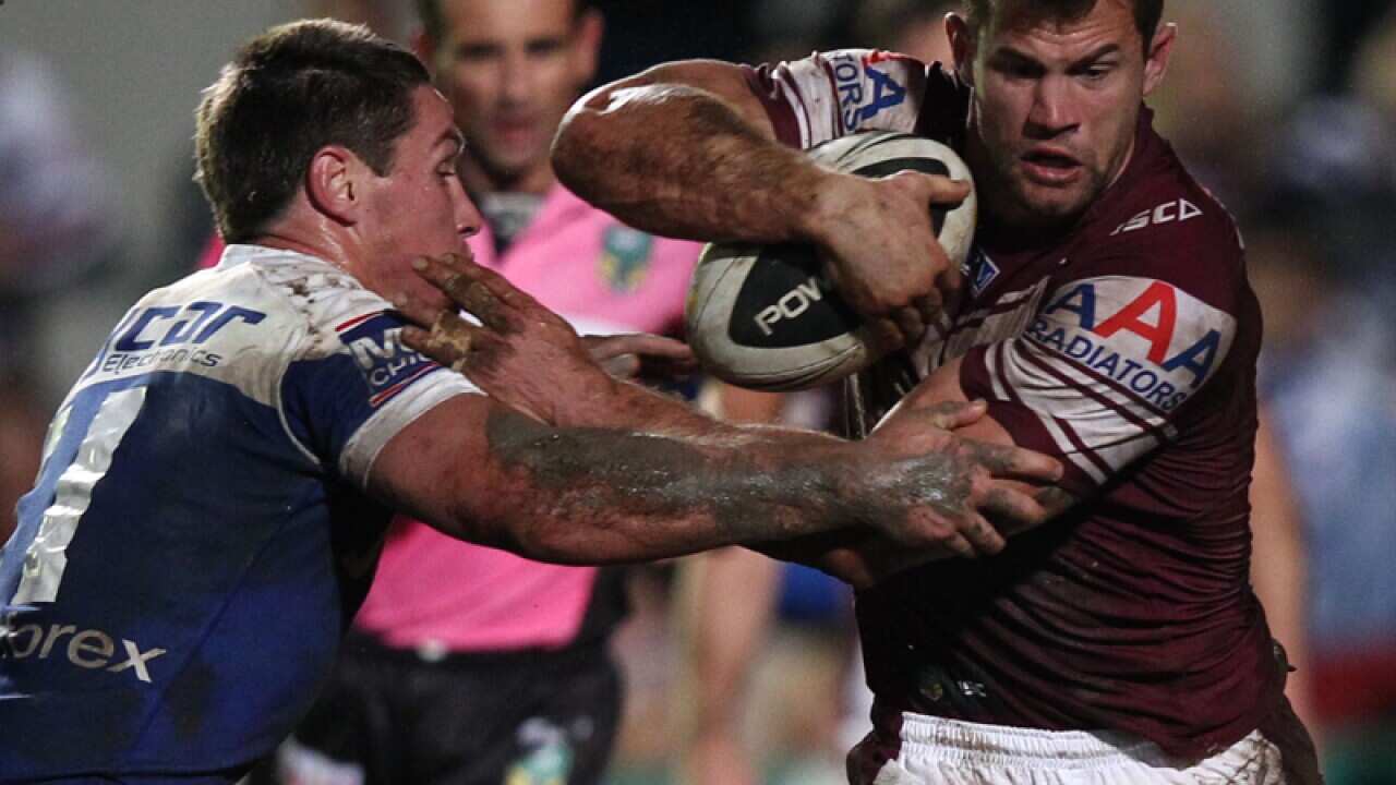 Manly player Brenton Lawrence (R)