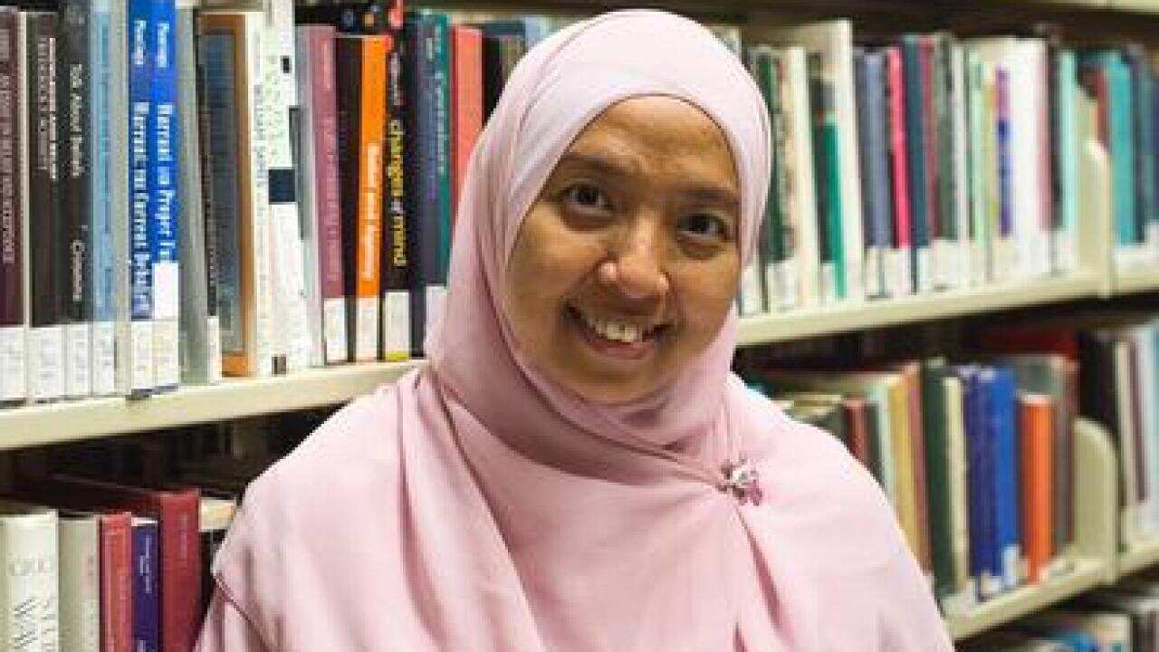 Ella S. Prihatini in the library of University of Western Australia – 29 Mar 2019.