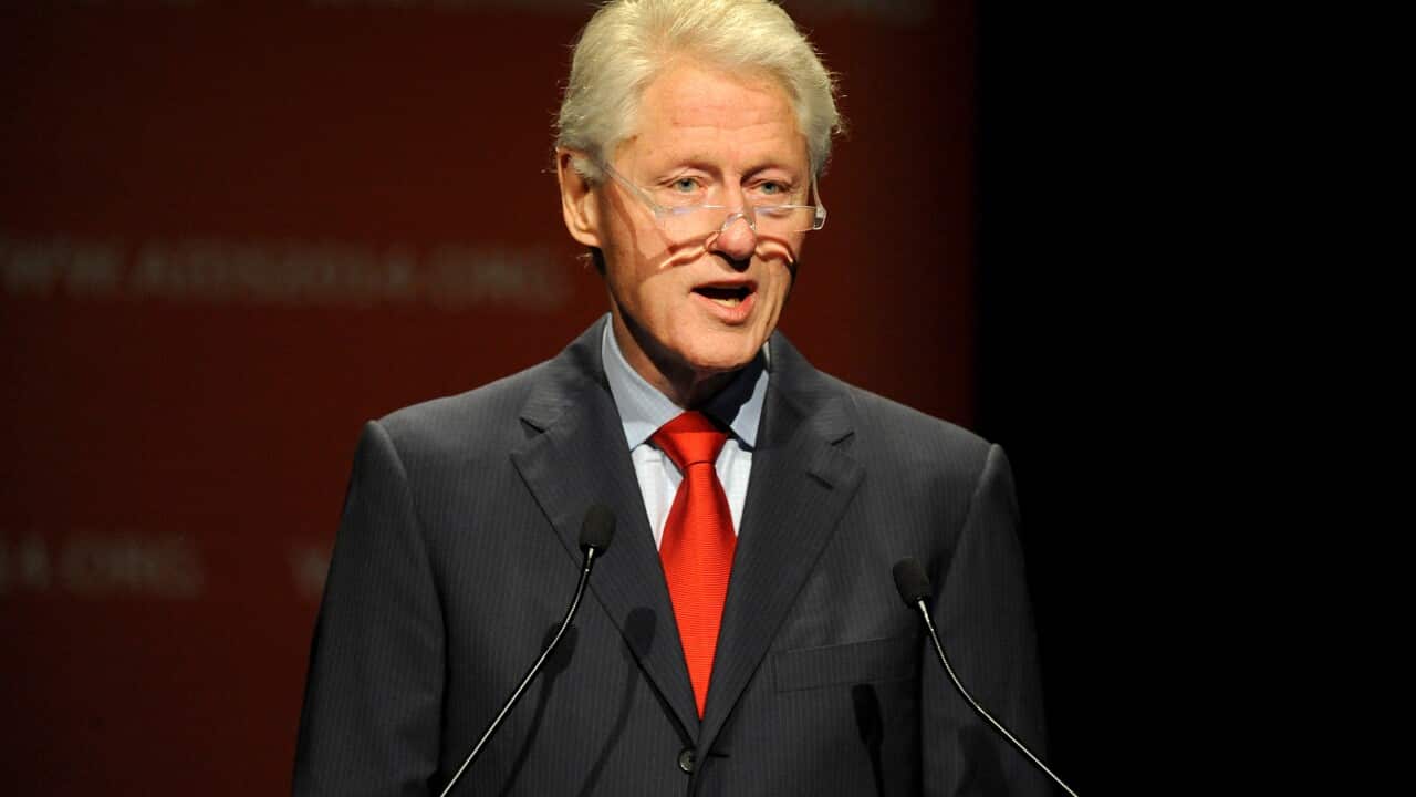 Former US President Bill Clinton was interrupted by protesters during his speech at the 2014 International AIDS Conference, in Melbourne today. (AAP)