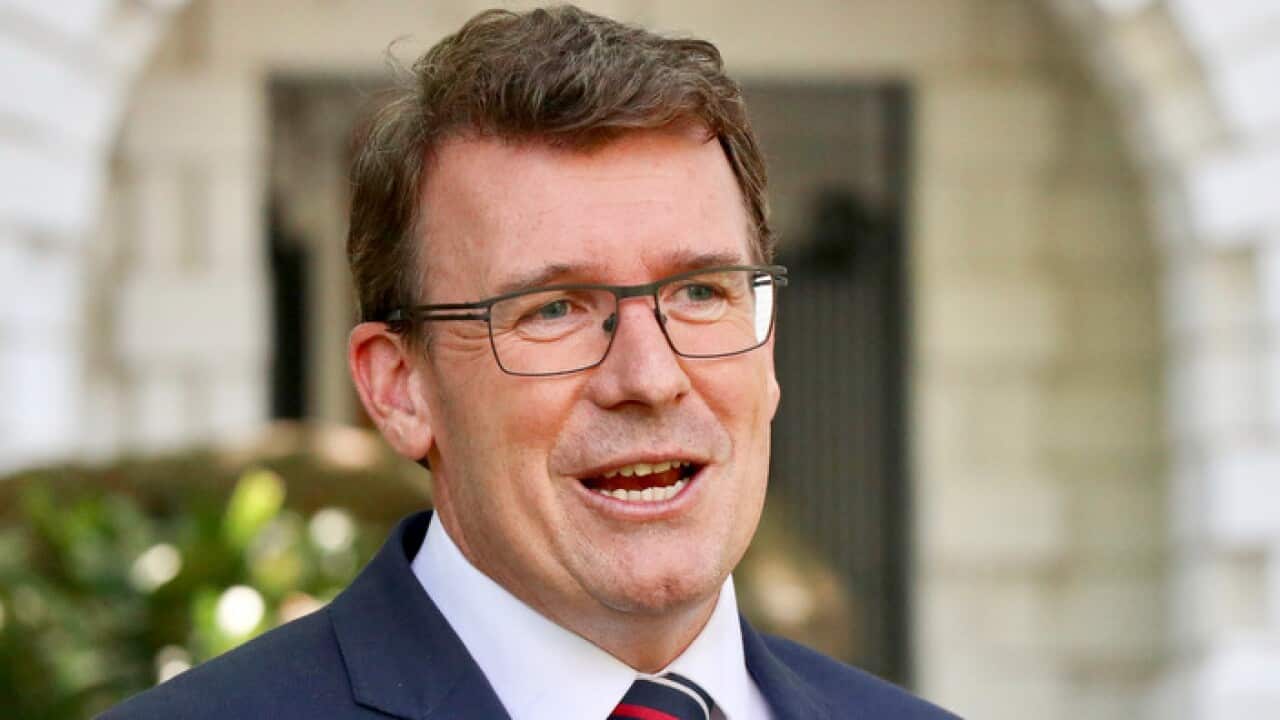 Minister for Human Services Alan Tudge speaks to the media during a press conference in Melbourne, Thursday, January 25, 2018. (AAP Image/Alex Murray) NO ARCHIVING
