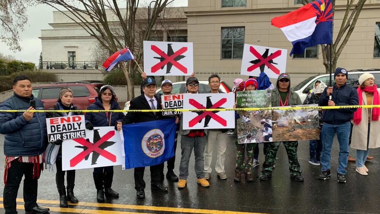 "End deadly air strike" poster seen at Myanmar ethnic group in US march against Burmese military dictatorship in DC. Source: Saw Greh Moo