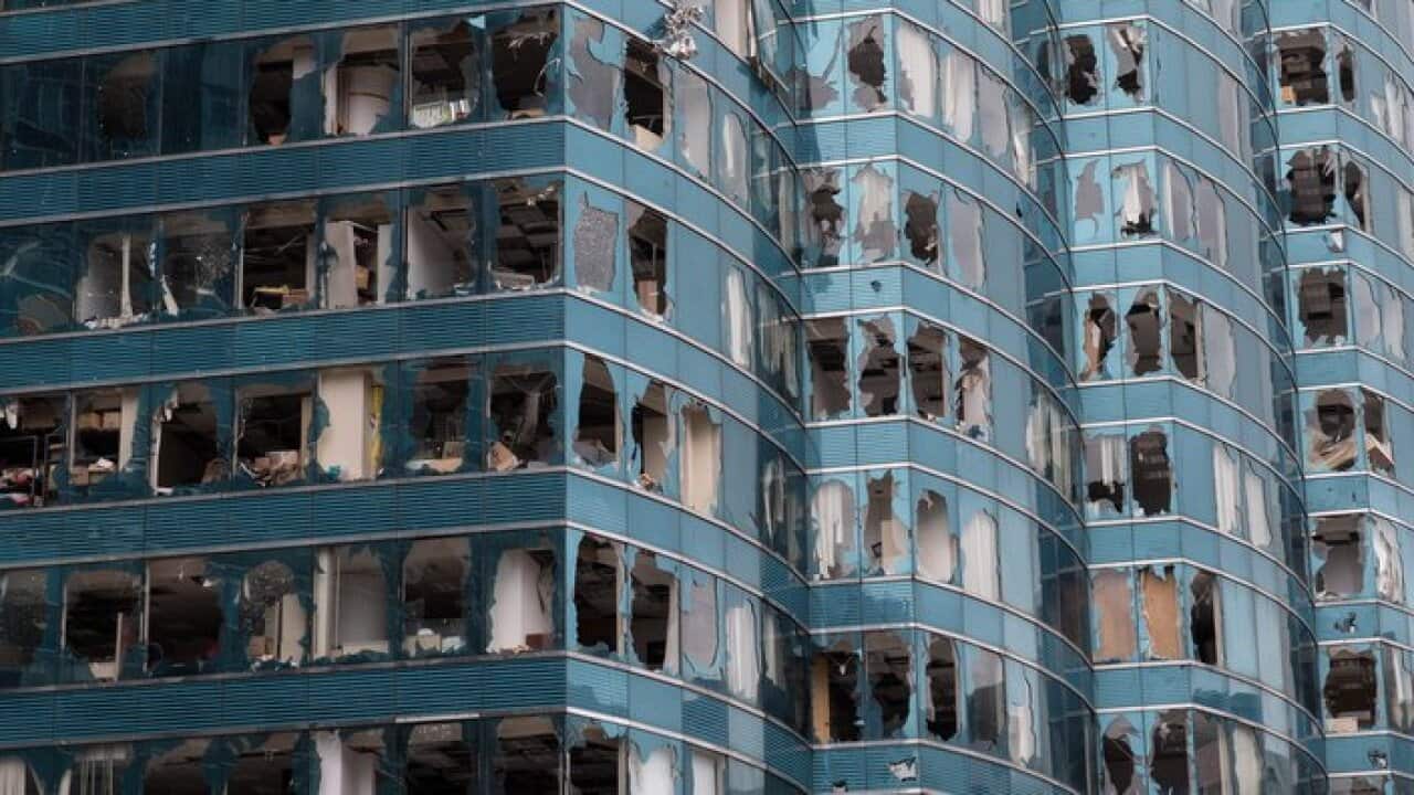 Office towers damaged by Typhoon Mangkhut in Hong Kong.