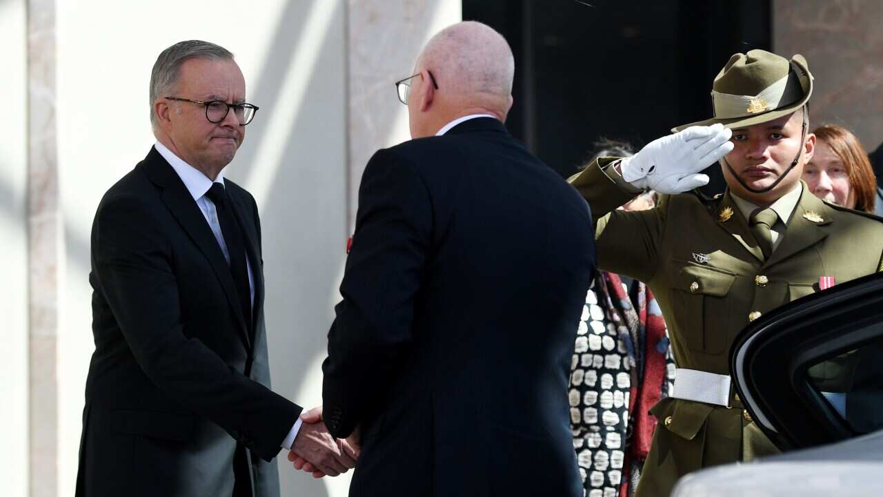 Governor-General David Hurley greets Australian Prime Minister Anthony Albanese