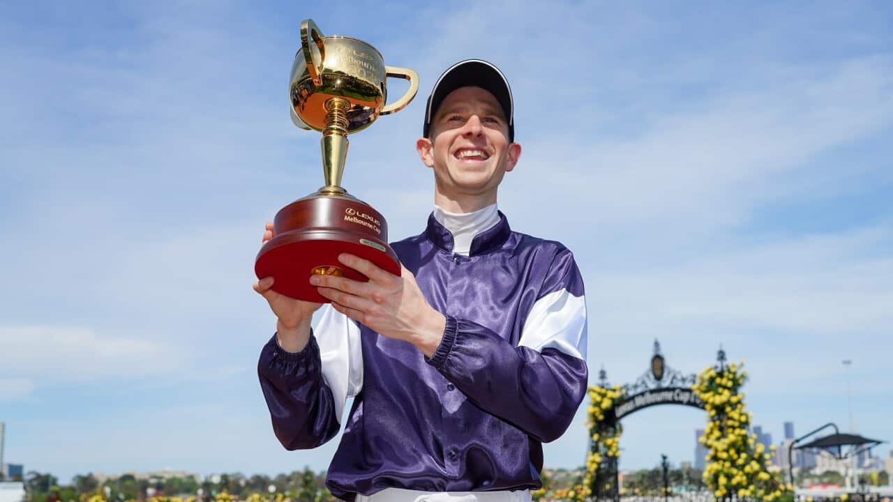Jye McNeil with the trophy after winning the Lexus Melbourne Cup