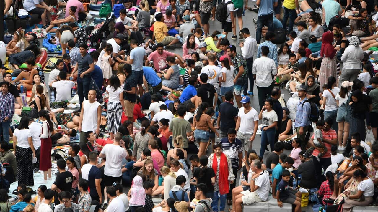 Crowds building around the Sydney Harbour foreshore at Circular Quay during New Year's Eve celebrations in Sydney, Tuesday, December 31, 2019.