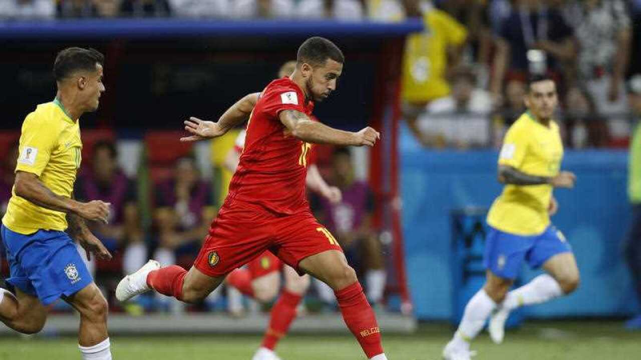 Belgium's Eden Hazard goes with the ball during the quarterfinal match between Brazil and Belgium at the 2018 soccer World Cup in the Kazan Arena, in Kazan.