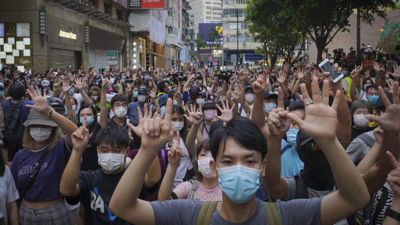 Protesters rally against the new national security law on the 23rd anniversary of Hong Kong's handover to China from Britain