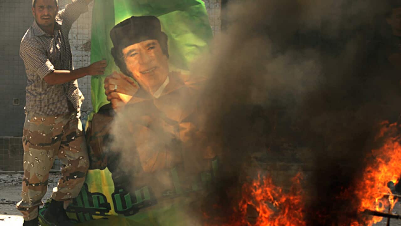 gaddafi_fire_rebel_L_110825_aap_381778377