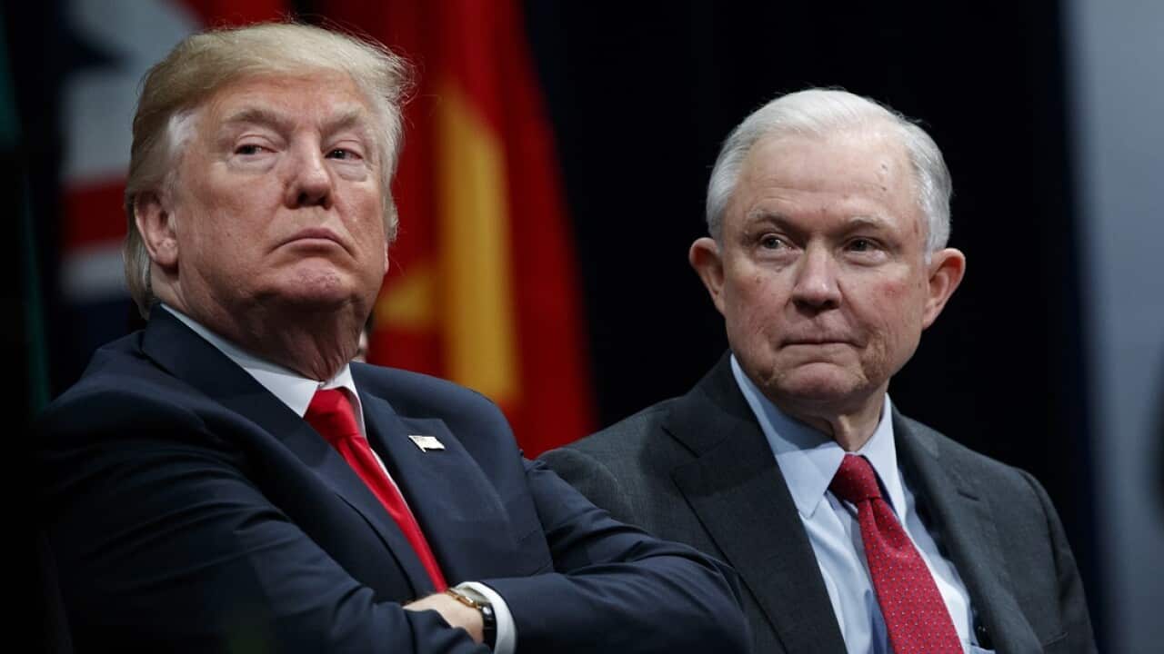 President Donald Trump sits with Attorney General Jeff Sessions during the FBI National Academy graduation ceremony, Friday, Dec. 15, 2017, in Quantico, Va. (AP Photo/Evan Vucci)