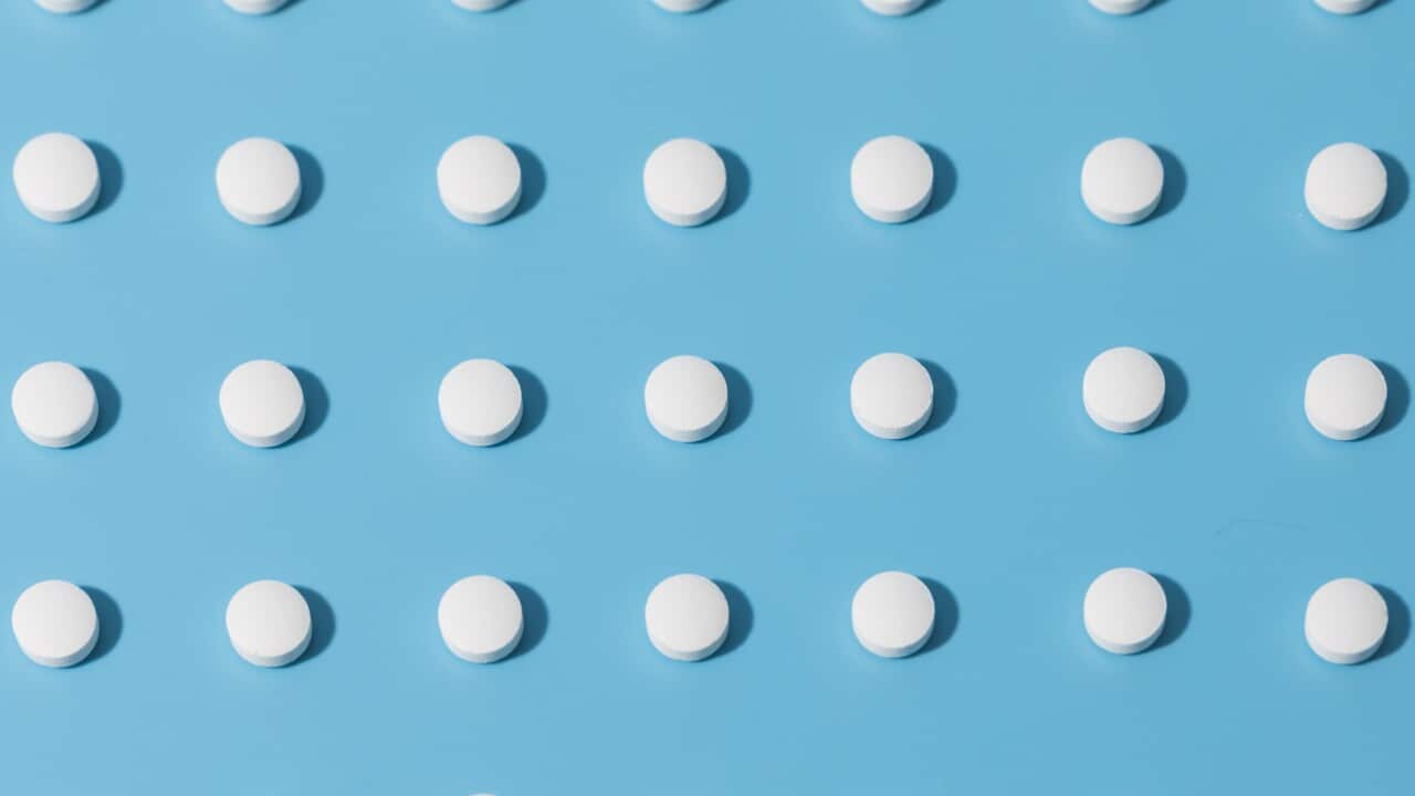 White medicine pills in rows