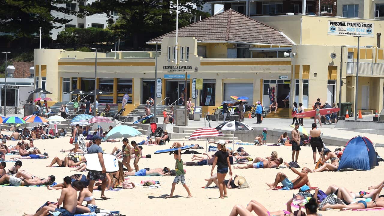People are seen at a beach