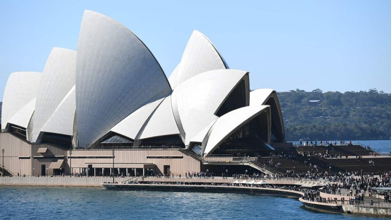 Sydney's iconic Opera House has raised intense debate over whether the building should be used for promotional purposes.