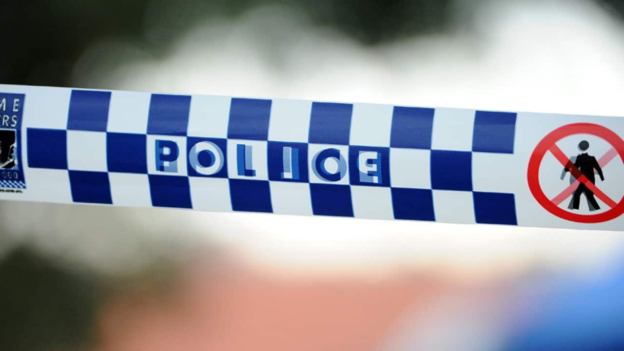 Police tape outside a home in Newcastle