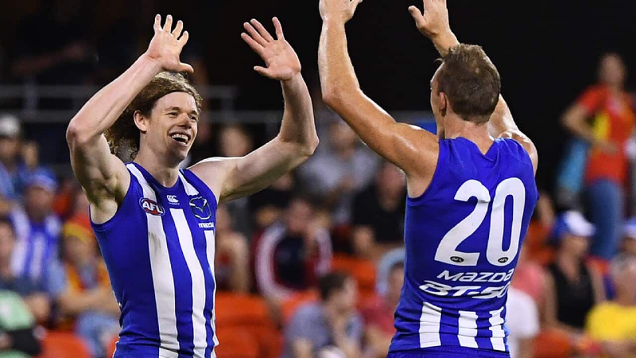 Kangaroos players Drew Petrie (left) and Ben Brown